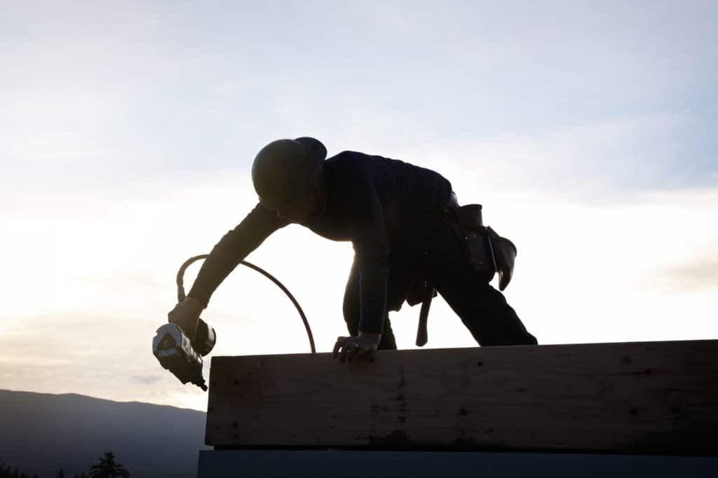 A carpenter working on a consruction site