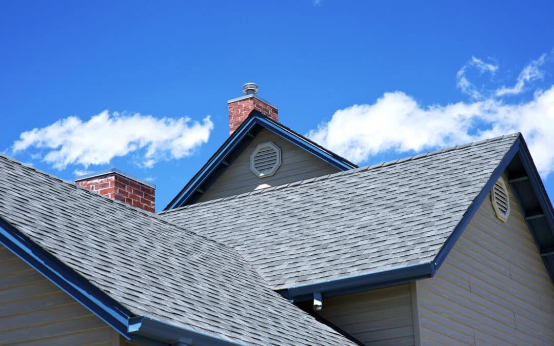 Asphalt shingles and brick chimneys